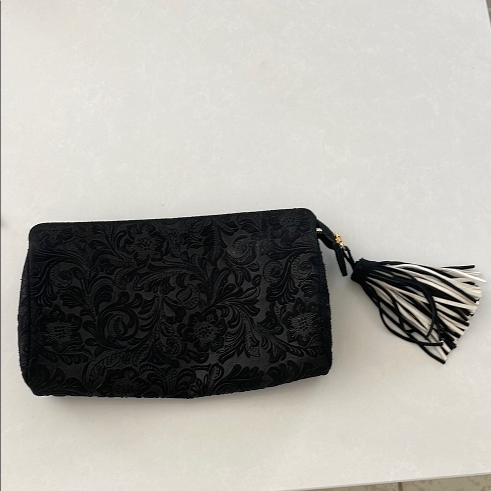 PEGGY DAVEN PALM BEACH.  Black Floral Embossed Clutch with Tassel